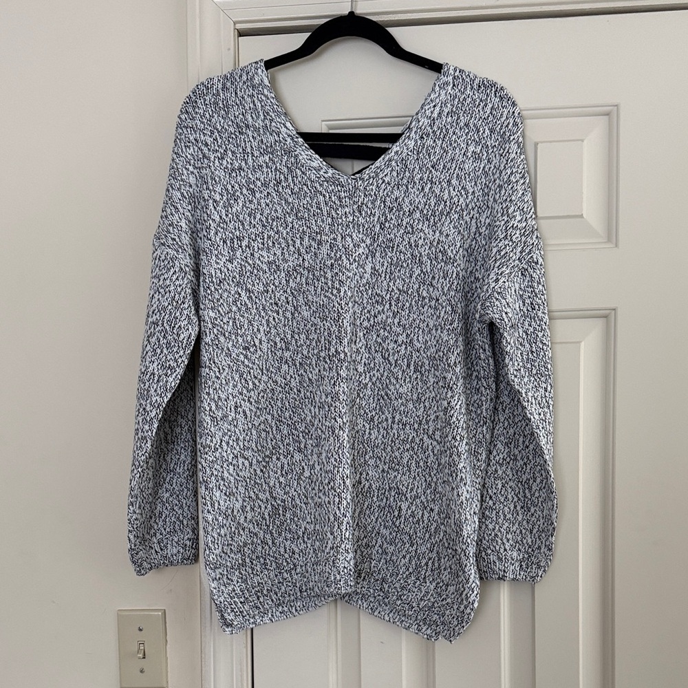 Elegant V-Neck Sweater in Black and White